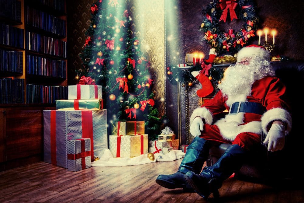 Santa,Claus,Brought,Gifts,For,Christmas,And,Having,A,Rest